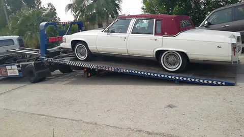 نقل سيارات مع سائق